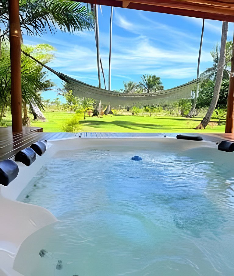 Casa com piscina e jacuzzi em Cumuruxatiba!