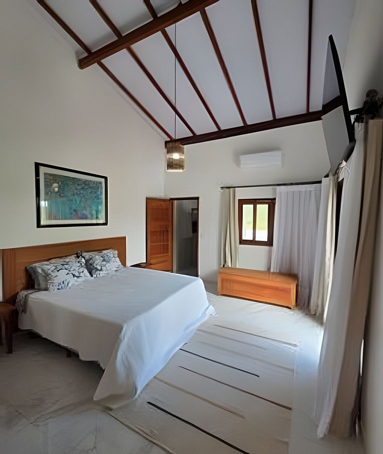 Casa com piscina e jacuzzi em Cumuruxatiba!